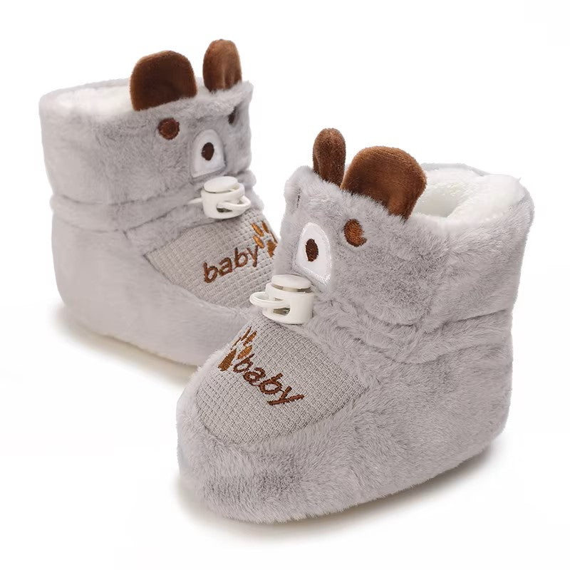 Chaussons bébé en peluche